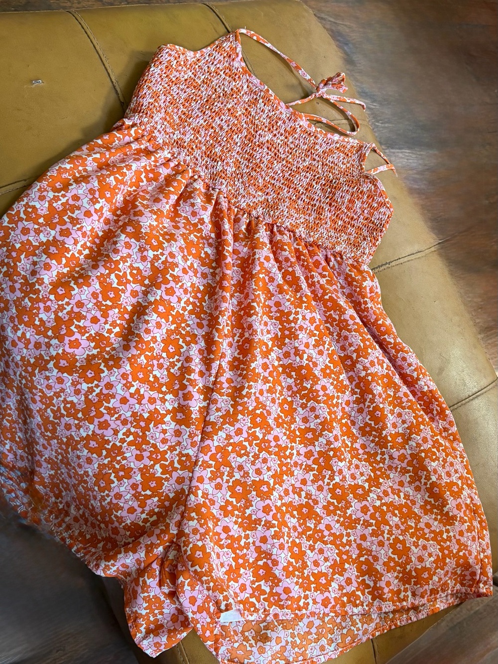 70’s Inspired Orange Floral Smocked Romper